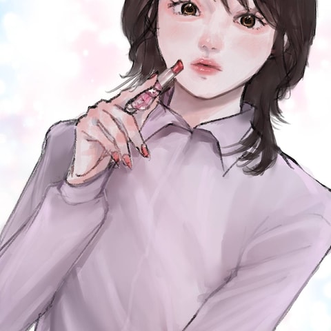 リップを塗る女の子