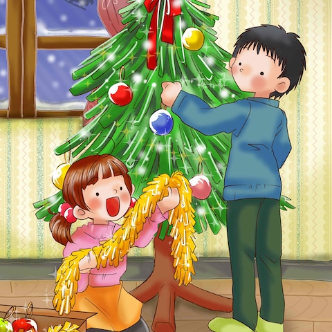 クリスマスツリーの飾り付けをする子供たち