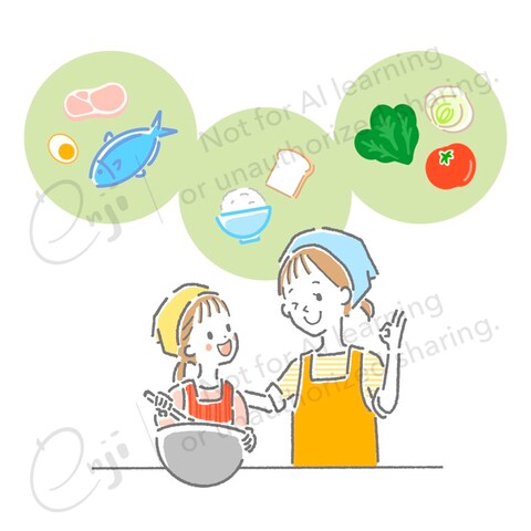 仲良く料理する親子