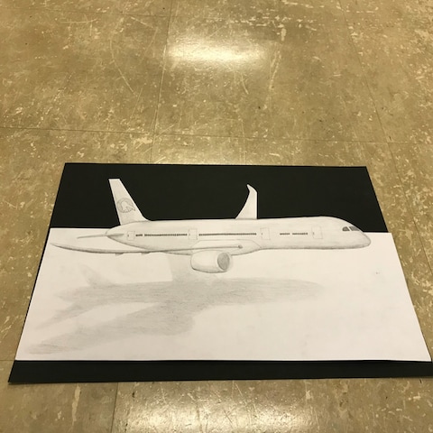 紙から飛び出る飛行機