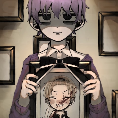 遺影を持った少年