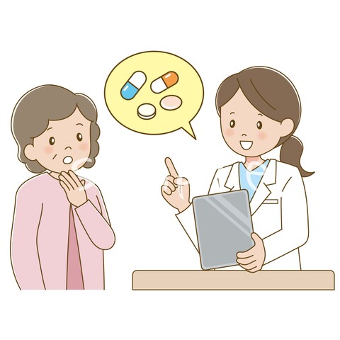 シニア女性に服薬指導をする薬剤師