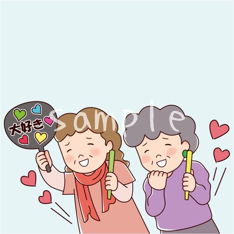 推しのコンサートで盛り上がる女性