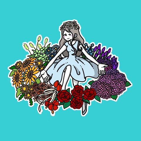 花に囲まれる女の子
