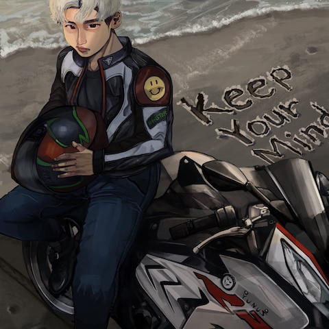 砂浜と青年とバイク
