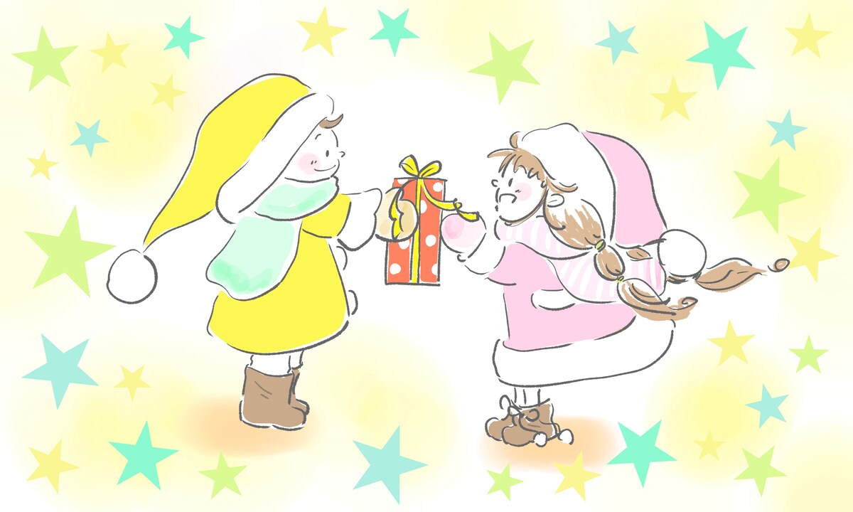 クリスマスプレゼントを渡す男の子と女の子