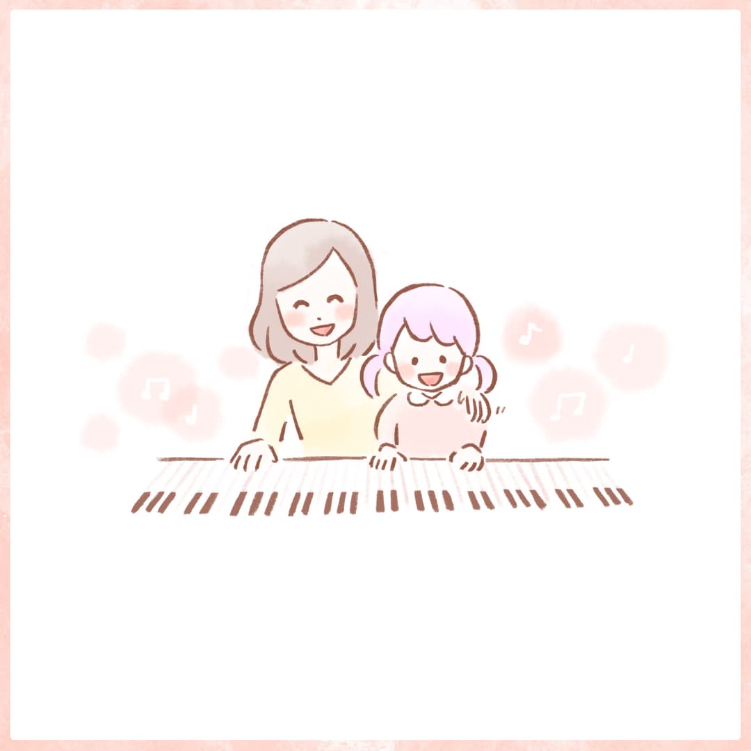 ピアノをしている親子